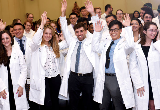 Photo shows participants at the inaugural PhD Lab Coat Ceremony
