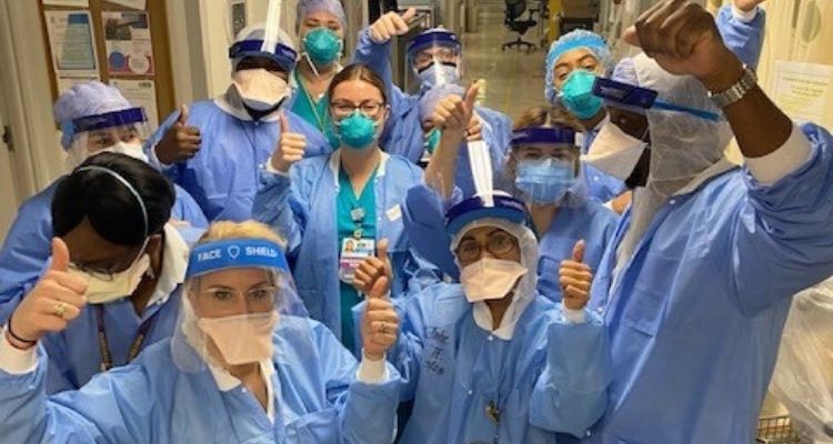a group of medical professionals in masks